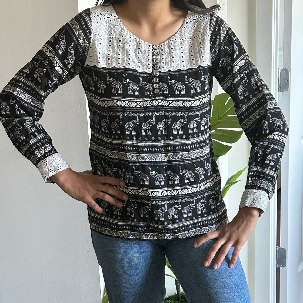 Ethnic print blouse with lace detailing!